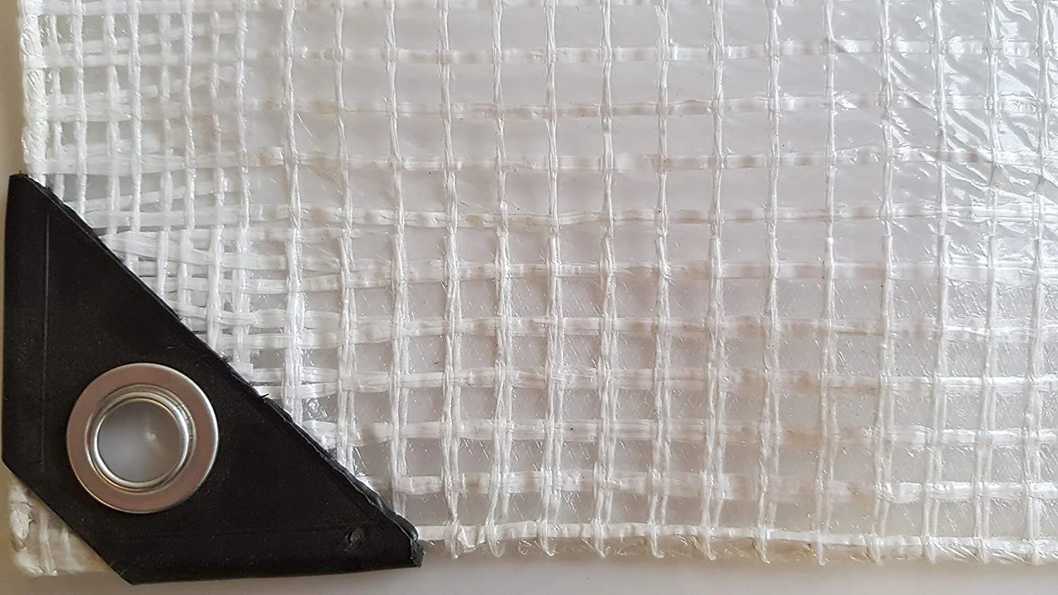 Mesh Tarpaulin vs Solid Tarpaulin